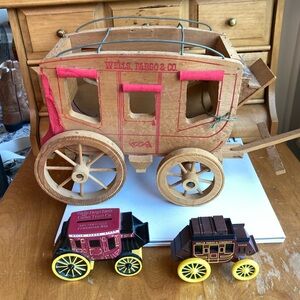 3 WELLS FARGO toys Wooden Stagecoach 1 cast iron stamp dispenser and 1 roller